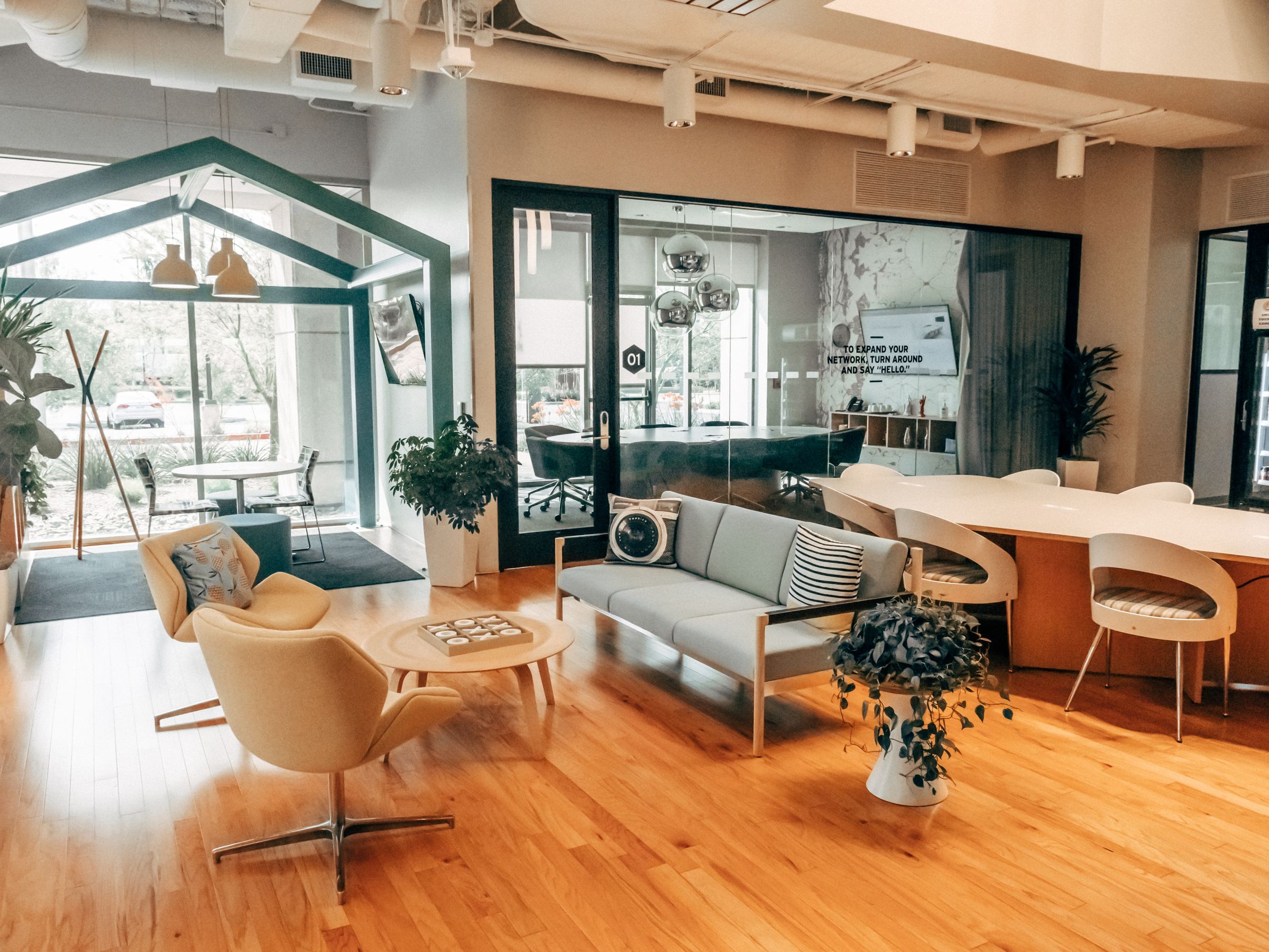 Light-filled contemporary office with warm architectural details